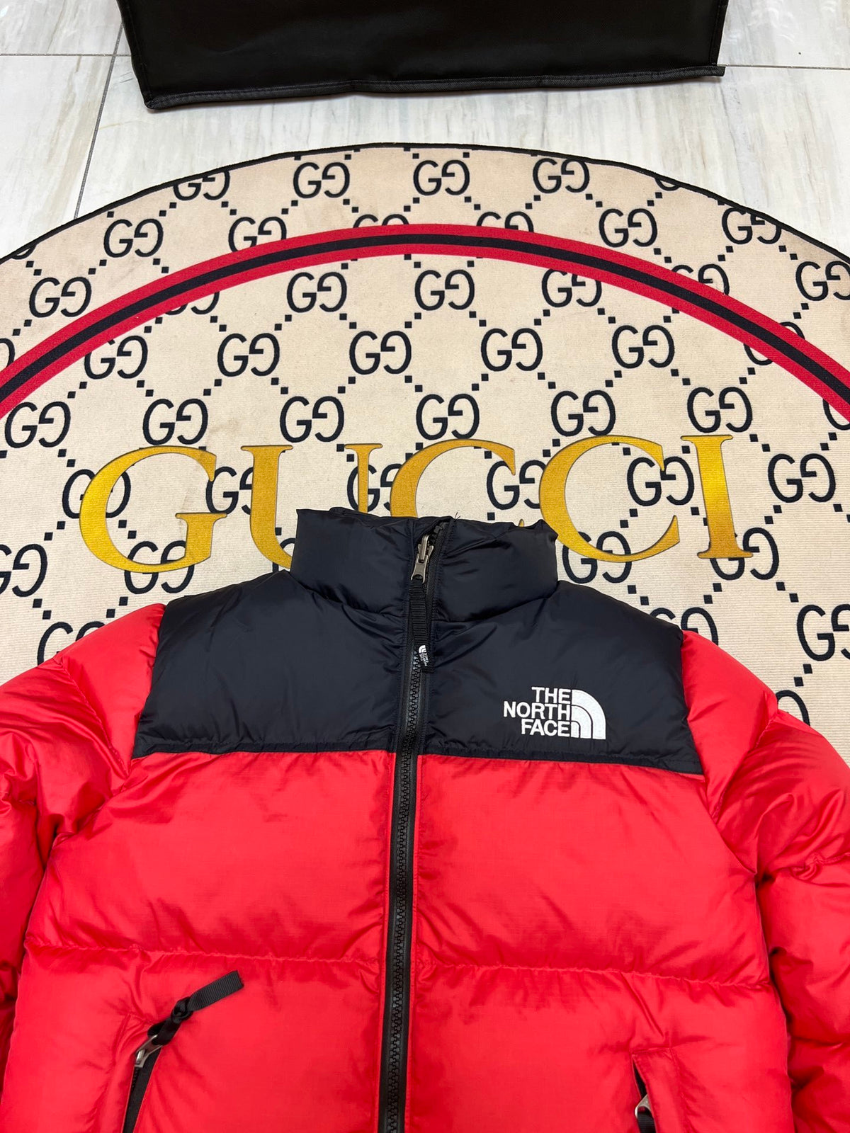 The North Face Red and Black Colorblock Stand-Collar Puffer Jacket