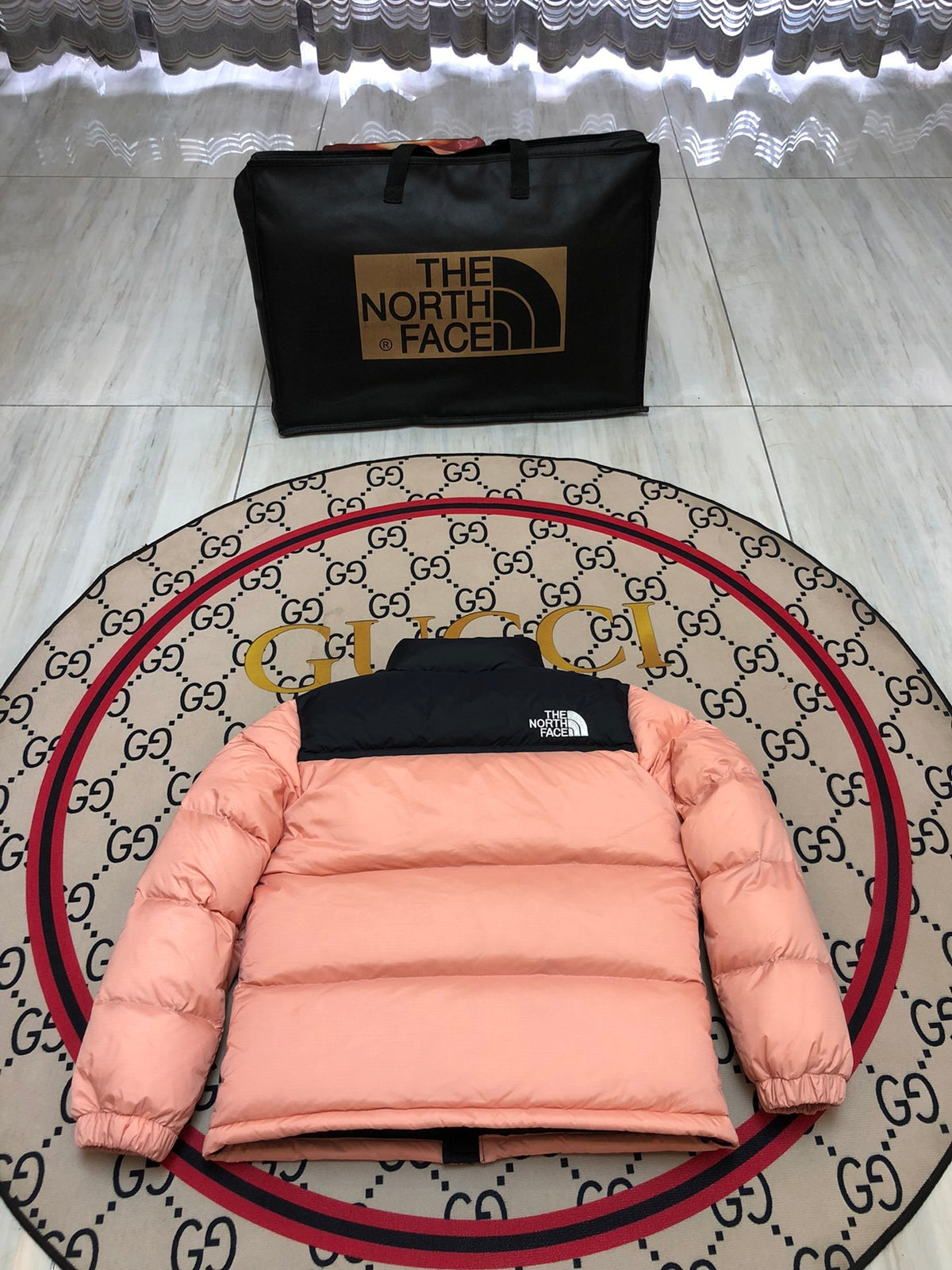 The North Face Peach Pink and Black Colorblock Stand-Collar Puffer Jacket