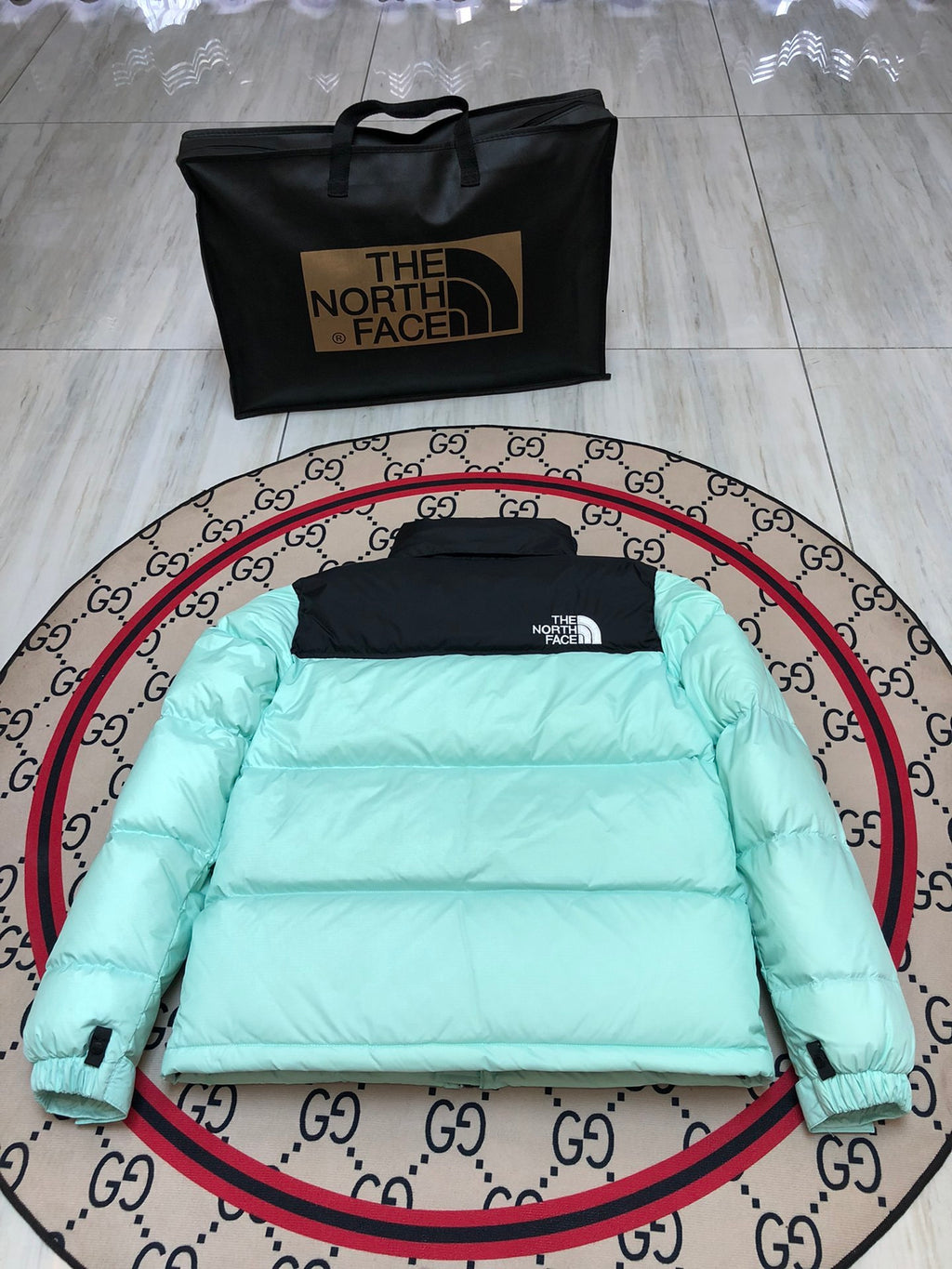 The North Face Mint Green and Black Colorblock Stand-Collar Puffer Jacket