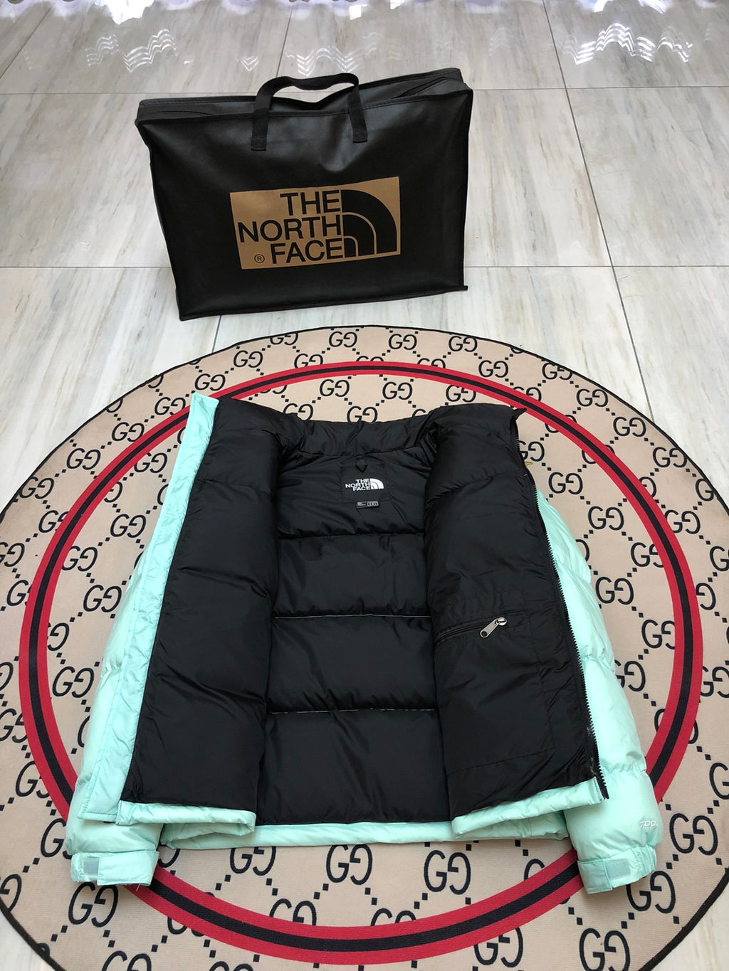 The North Face Mint Green and Black Colorblock Stand-Collar Puffer Jacket