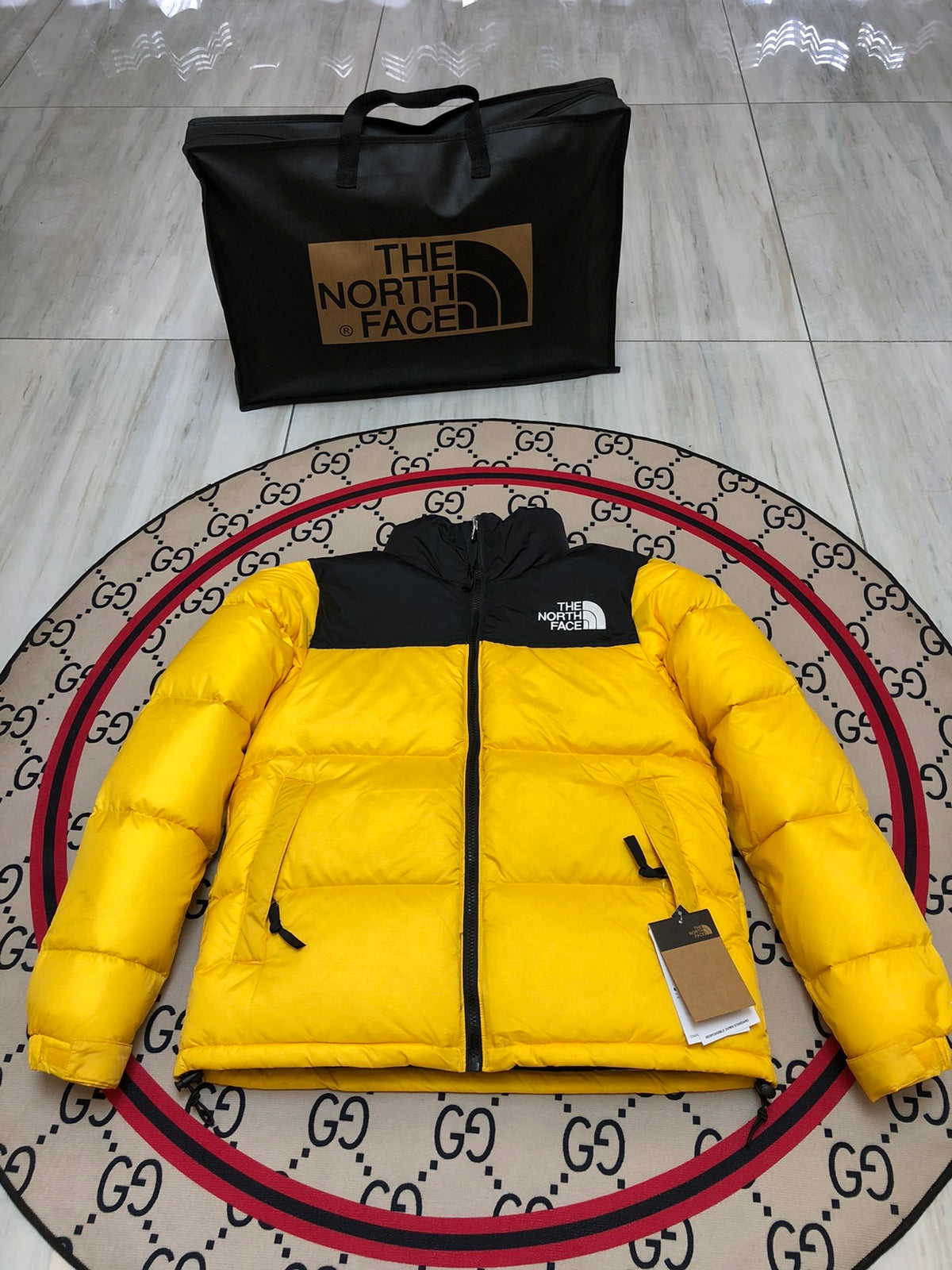The North Face Yellow and Black Colorblock Stand-Collar Puffer Jacket