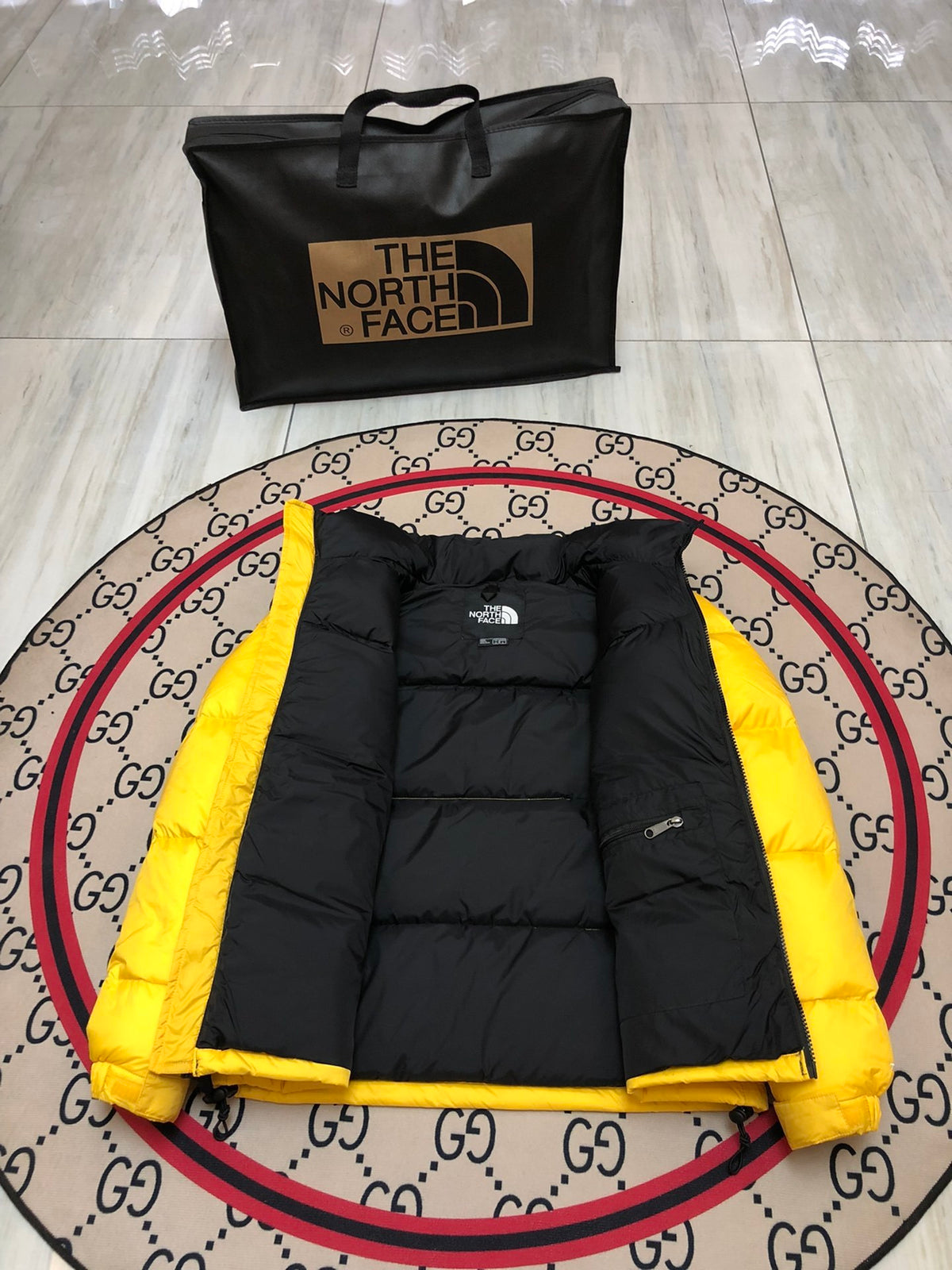 The North Face Yellow and Black Colorblock Stand-Collar Puffer Jacket