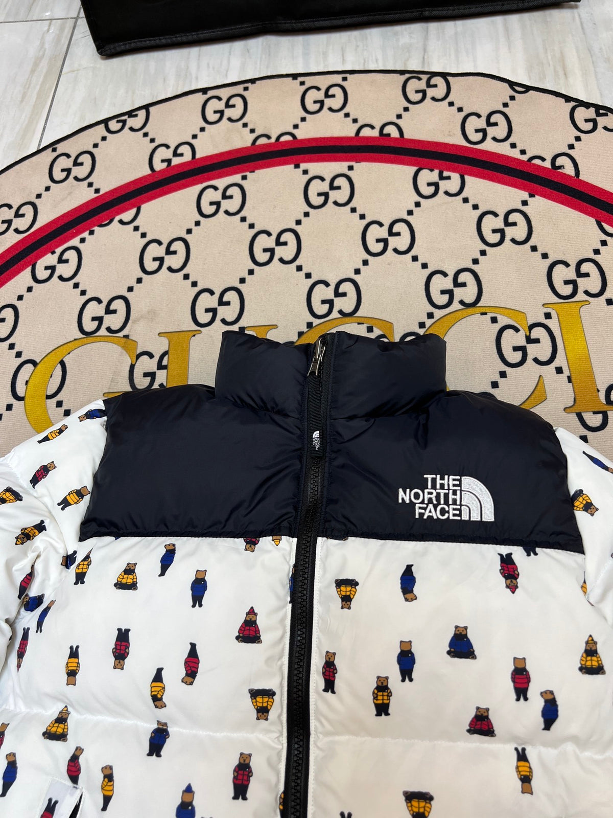 The North Face White and Black Bear Print Stand-Collar Puffer Jacket