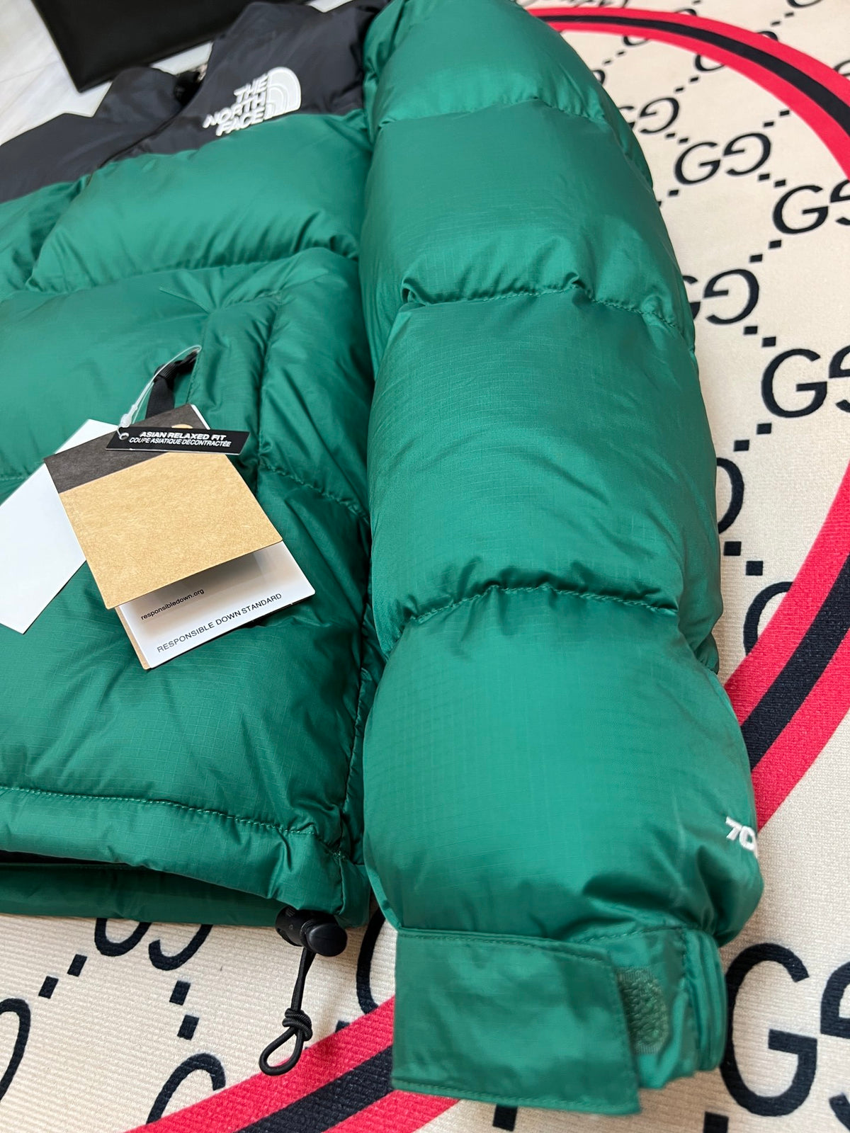 The North Face Emerald Green and Black Colorblock Stand-Collar Puffer Jacket