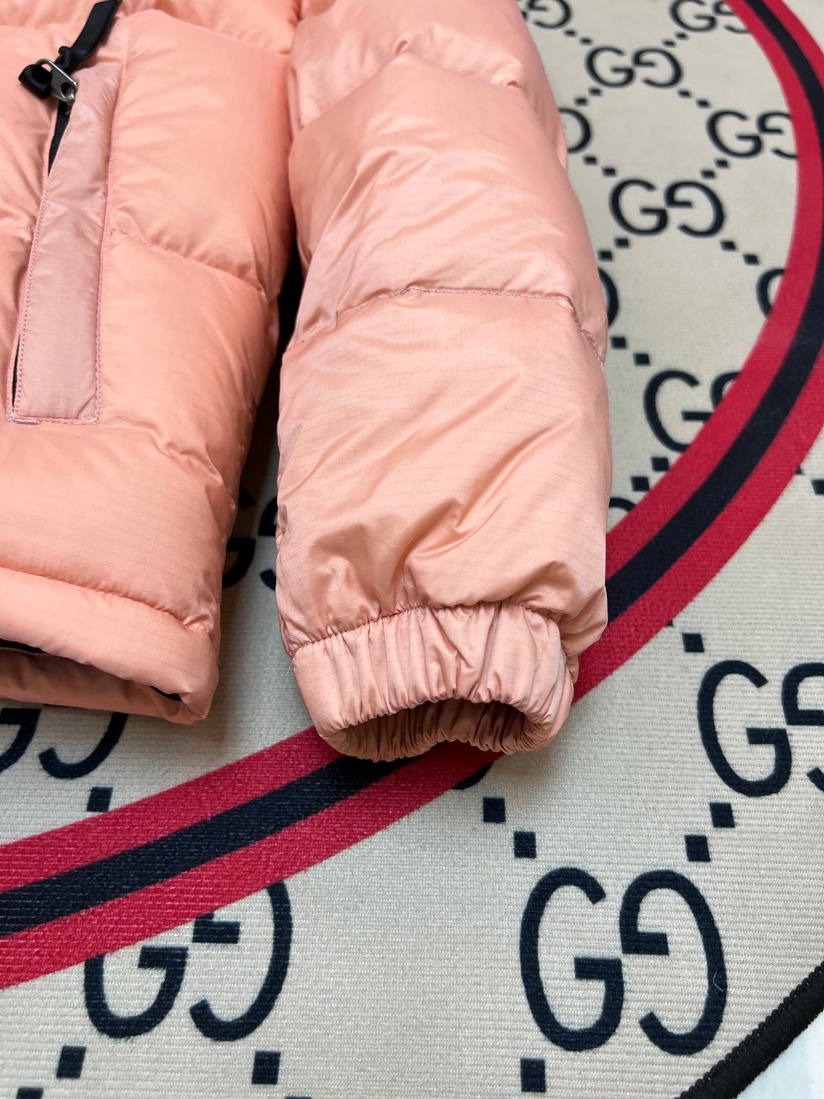 The North Face Peach Pink and Black Colorblock Stand-Collar Puffer Jacket