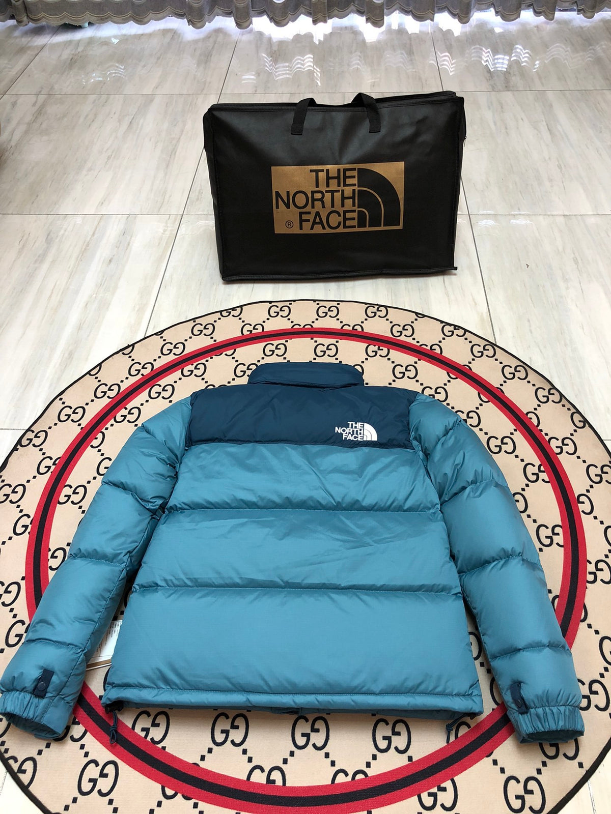 The North Face Teal Blue and Navy Colorblock Stand-Collar Puffer Jacket