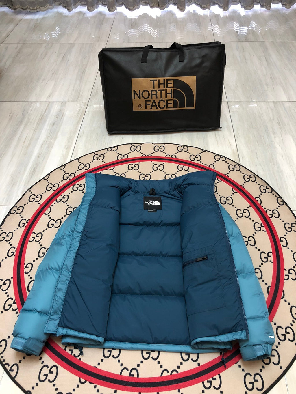 The North Face Teal Blue and Navy Colorblock Stand-Collar Puffer Jacket