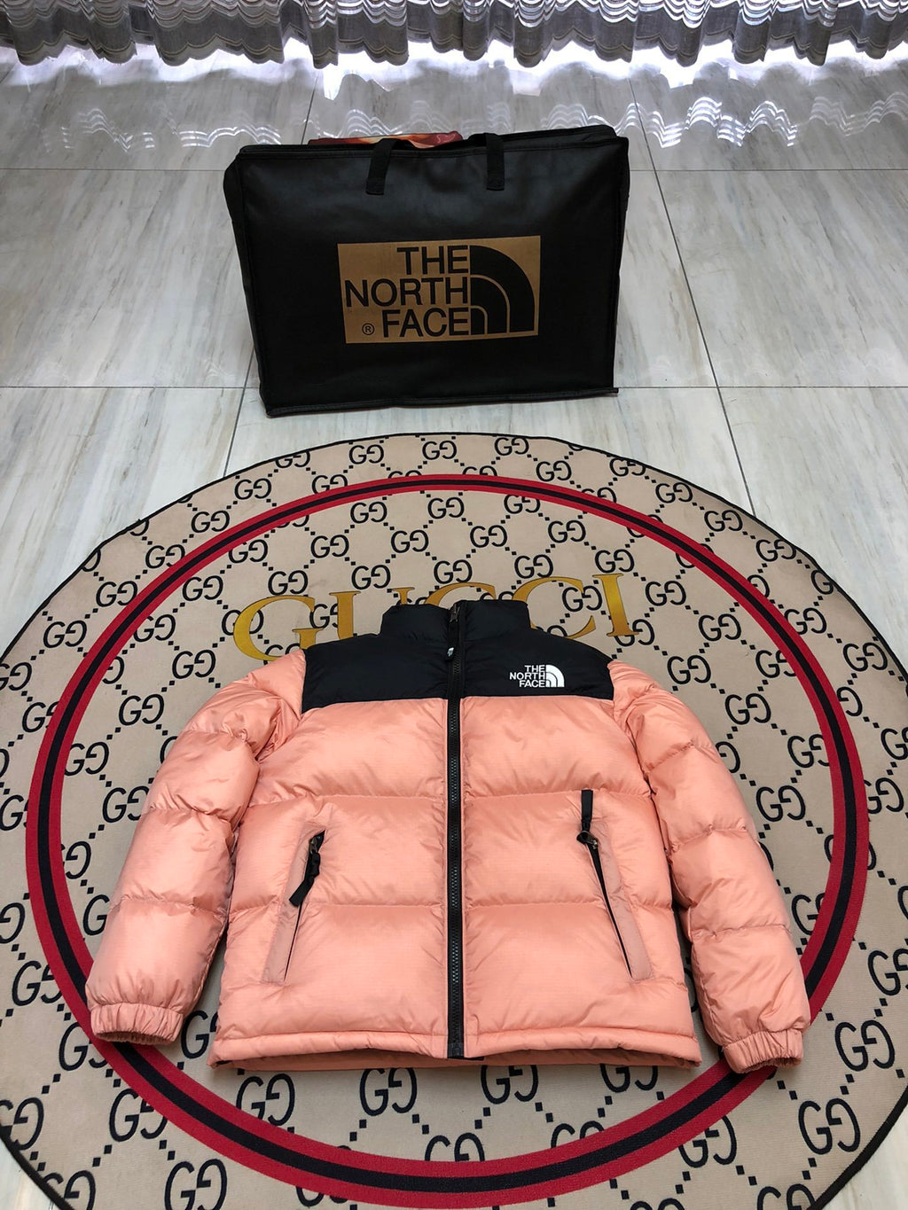 The North Face Peach Pink and Black Colorblock Stand-Collar Puffer Jacket