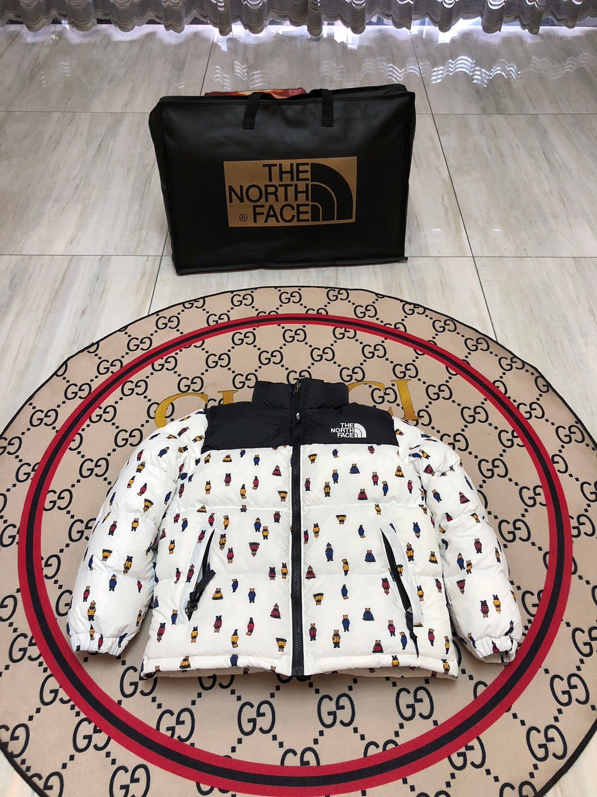 The North Face White and Black Bear Print Stand-Collar Puffer Jacket