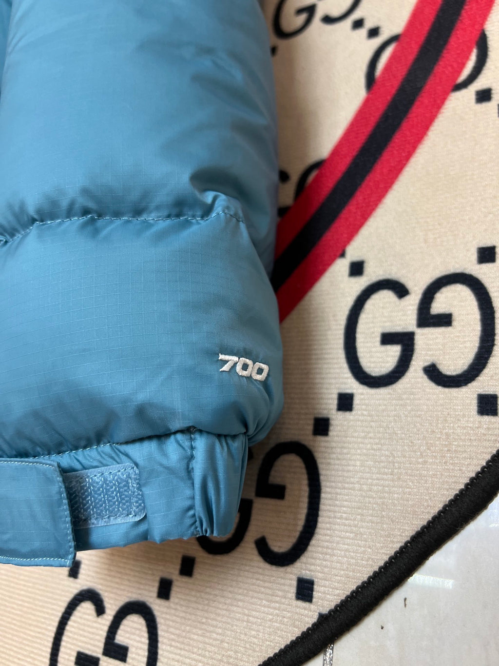 The North Face Teal Blue and Navy Colorblock Stand-Collar Puffer Jacket