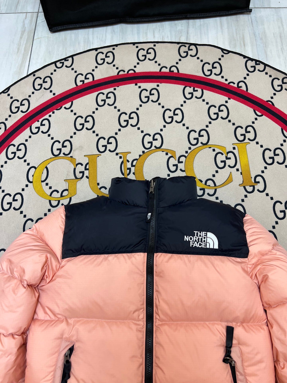 The North Face Peach Pink and Black Colorblock Stand-Collar Puffer Jacket