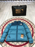 The North Face Teal Blue and Navy Colorblock Stand-Collar Puffer Jacket