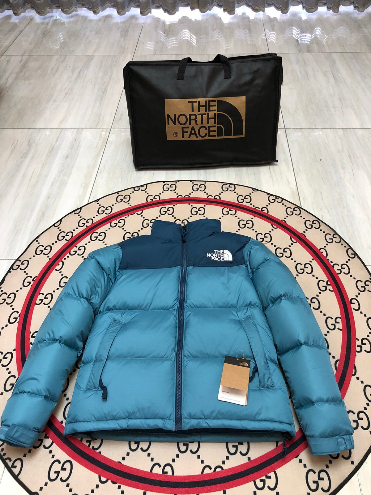 The North Face Teal Blue and Navy Colorblock Stand-Collar Puffer Jacket